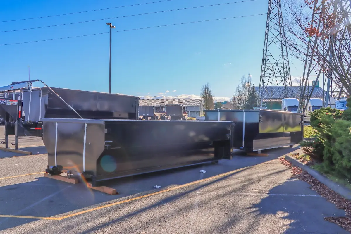 Roll-off dumpster ready for waste disposal at job site for 4 Yard Dumpster Rental in Rolling Hills Estates